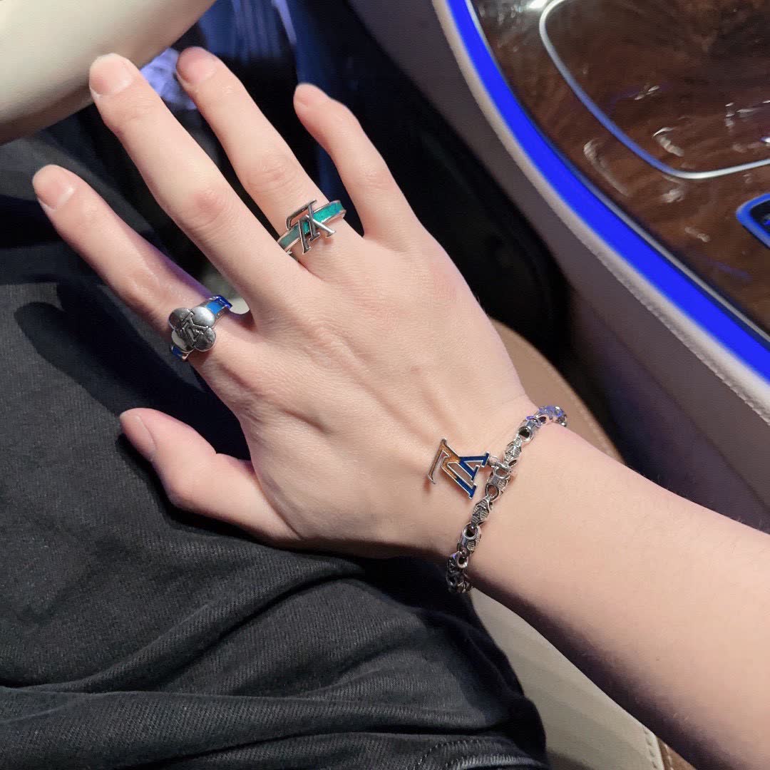 Louis Vuitton Silver Bracelet with LV Logo Charm